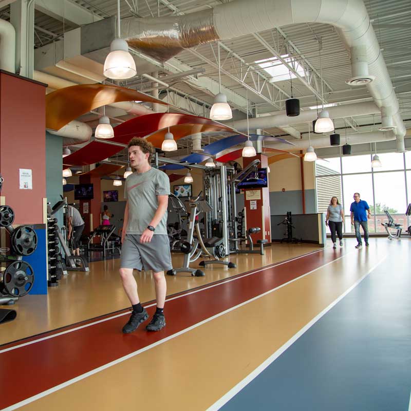 A Man Walking Inside a Gym | Health and Fitness Center | The Salvation Army Kroc Center
