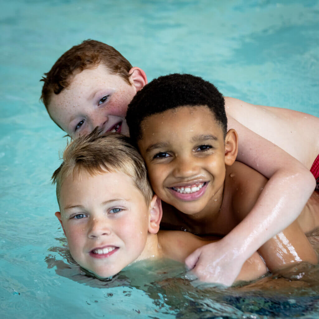 Boys playing in the water. Swimming Lesson Kroc Center Quincy, IL